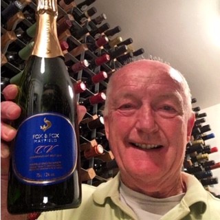 Wine expert Oz Clarke with a bottle of Fox & Fox CV 2014